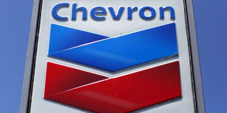 A Chevron gas station sign is seen in Del Mar, California, in this April 25, 2013 file photo Report: Chevron set to trade Venezuelan oil if US eases sanctions