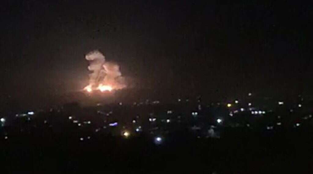 Smoke and fire billow during a reported Israeli air strike on the outskirts of Damascus, Nov. 20, 2019 Israel 'will pay' for alleged IAF strikes that killed 2 IRGC officers in Syria, Tehran warns