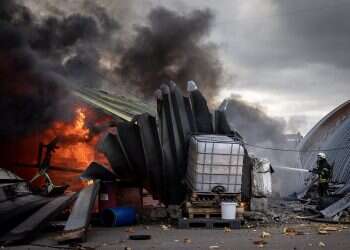 Firefighters try to extinguish a fire after a chemical warehouse was hit by Russian shelling on the eastern frontline near Kalynivka village on March 08, 2022, in Kyiv, Ukraine Russia trades barbs with US, UK over use of chemical weapons in Ukraine