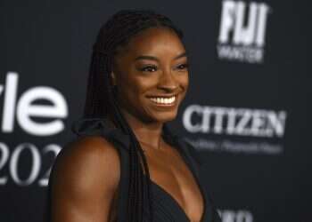 Gymnastics superstar Simone Biles chooses 2 dresses by Israeli designer for her big day