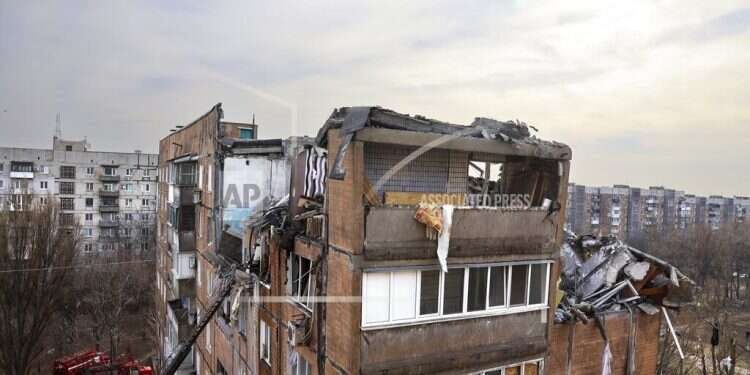 Despite pledge to scale back, Russia hits near Kyiv, other city