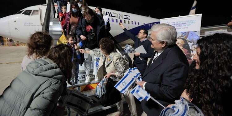 CUFI founder Pastor John Hagee, rights, greets Ukrainian Jewish refugees arriving in Israel, March 10, 2022 Christians United for Israel raises $2.5M to bring Ukrainian Jews to safety