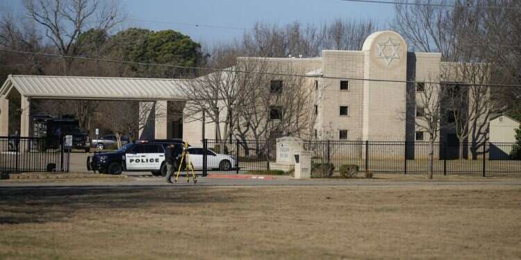 Law enforcement process the scene in front of the Congregation Beth Israel synagogue on Jan. 16, 2022
Chair used to fend off Texas synagogue shooter to be shown at Jewish museum