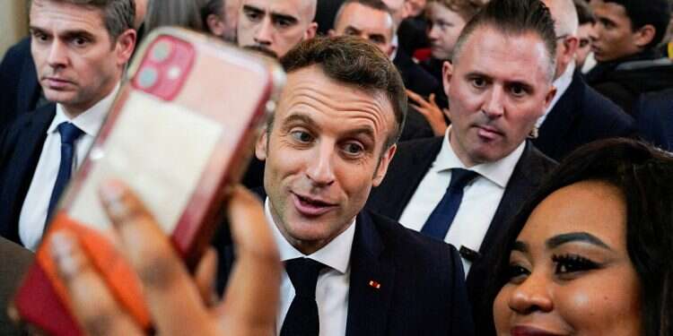 Economic record, Ukraine war could help Macron defeat resurgent Le Pen