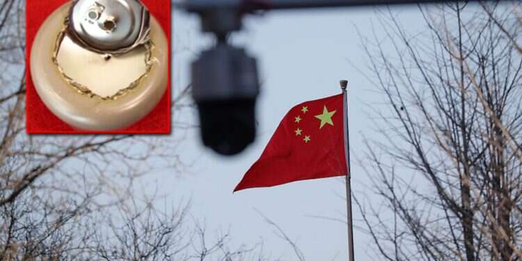 A view of a Chinese flag, with the bottom of the allegedly bugged thermal mug (inset) Shin Bet confirms gift by Chinese Embassy to Israeli minister not bugged