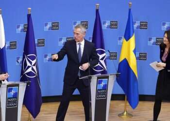 NATO Secretary General Jens Stoltenberg, center, greets Finland's Foreign Minister Pekka Haavisto, left, and Sweden's Foreign Minister Ann Linde, right, at the end of a media conference at NATO headquarters in Brussels, Jan. 24, 2022 Report: Finland, Sweden set to join NATO as soon as summer
