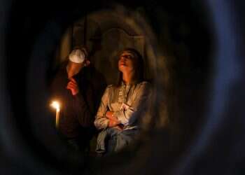 Graffiti-covered stone slab might mark lost altar of Church of the Holy Sepulcher