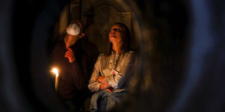 Graffiti-covered stone slab might mark lost altar of Church of the Holy Sepulcher