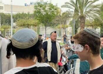 Worshippers pray at site of deadly Tel Aviv attack