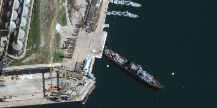 Satellite image shows cruiser Moskva in port Sevastopol in Crimea on April 7, 2022 Moskva cruiser sinks due to fire, Russia says day after missile attack