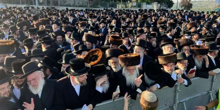 A year after disaster, thousands mark Lag B'Omer on Mt. Meron