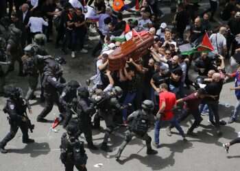 Israel faces backlash over clashes at Al-Jazeera reporter's funeral