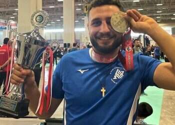 Kickboxer Loay Sakas Gold-medalist kickboxer waves Israeli flag at World Cup in Turkey