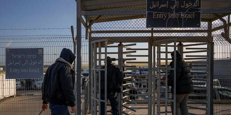 Palestinian workers enter Israel after crossing from Gaza on the Israeli side of Erez crossing between Israel and the Gaza Strip, March 27, 2022 4,600 Gazans enter Israel, highest total at Erez Crossing in 15 years