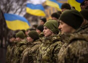 Ukrainian Army soldiers pose for a photo as they gather to celebrate a Day of Unity in Odessa, Ukraine, Wednesday, Feb. 16, 2022 'Help is on the way': Senate ships $40B Ukraine aid bill to Biden for signature