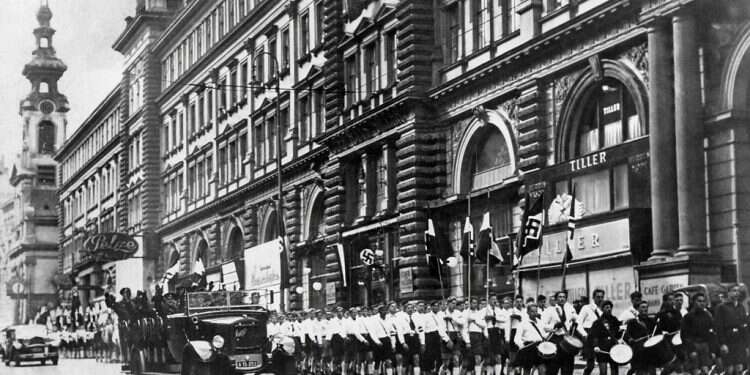 Parade in Vienna after Austria's annexation by Nazi Germany, March 15, 1938 Germany sues Italy at ICJ over Nazi-era compensation claims