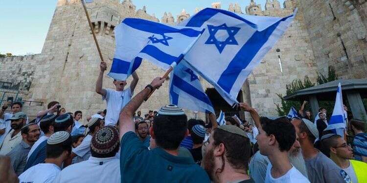 Police determined to allow flag march to proceed as planned despite Hamas threats