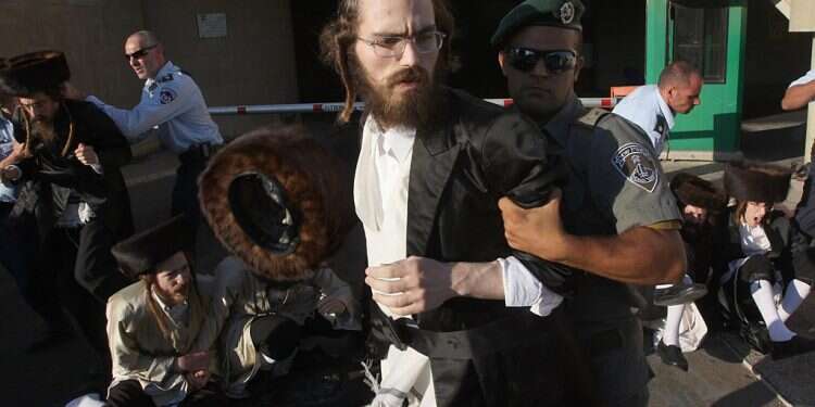 At least two people have been arrested Several arrested in clashes between rival Haredi factions in Jerusalem