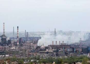 Smoke rises from the Metallurgical Combine Azovstal in Mariupol, May 5, 2022 Putin to Bennett: Safe passage still possible for civilians at besieged Ukrainian plant