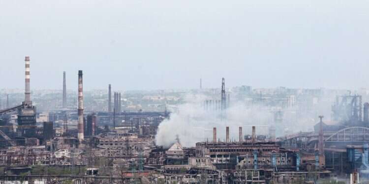 Smoke rises from the Metallurgical Combine Azovstal in Mariupol, May 5, 2022 Putin to Bennett: Safe passage still possible for civilians at besieged Ukrainian plant