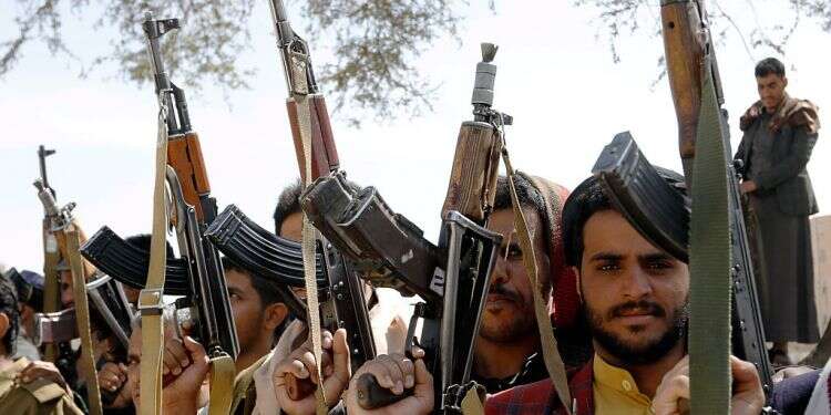 Armed Houthi supporters , in Sana'a, Nov. 24 2021 Yemen's Houthis criminalize ties with Israel