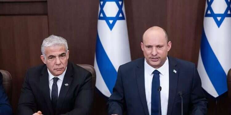 Foreign Minister Yair Lapid and Prime Minister Naftali Bennett PM says calling early election 'toughest' but 'right' decision, vows to help Lapid