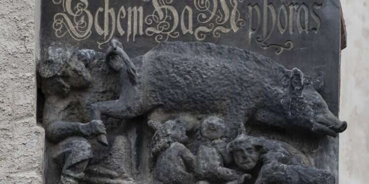 The 'Judensau,' or 'Jew pig,' sculpture is displayed on the facade of the Stadtkirche (Town Church) in Wittenberg German federal court mulls bid to remove 'Jew pig' statue