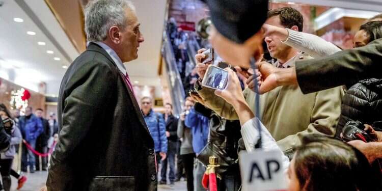 Carl Paladino, left, speaks to members of the media at Trump Tower on Dec. 5, 2016
Republican congressional candidate: Hitler comment was a mistake