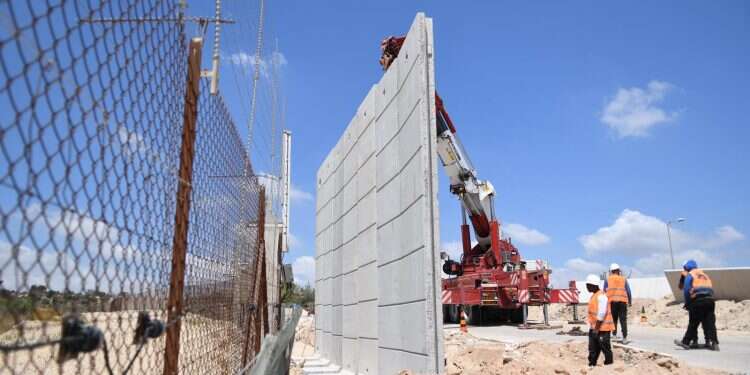 Protective walls are put in place at key points of the security barrier in the northern West Bank on June 21, 2022 Israel begins building replacement W. Bank security barrier