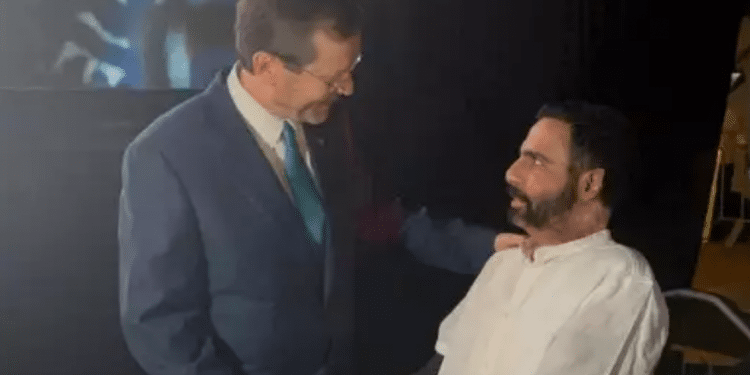 President Isaac Herzog shakes hands with Itzik Saidyan at an event for the Friends of Sheba Medical Center on June 19, 2022 PTSD-stricken IDF vet who set himself on fire makes first public appearance