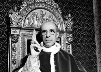 Pope Pius XII, wearing the ring of St. Peter, raises his right hand in a papal blessing at the Vatican, in September 1945
Pope orders publication of World War II-era 'Jewish files'