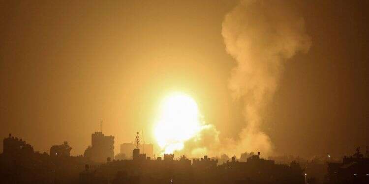 An explosion is caused by Israeli airstrikes on a Hamas military base in Khan Younis, April 19, 2022 IAF strikes Hamas targets in response to rocket fire