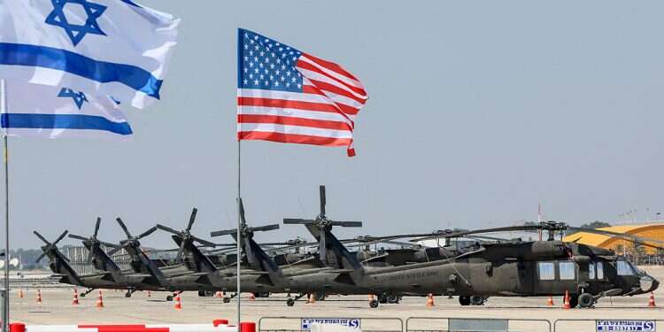 Israeli and American flags against the backdrop of US Army Black Hawks at Ben Gurion Airport ahead of Biden's visit, July 12, 2022 Hours before presidential visit, US-Israel technology initiative launched