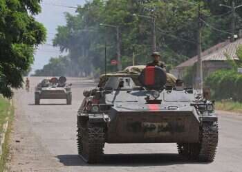 Pro-Russian troops in the city of Lysychansk in the Luhansk Region, Ukraine July 4, 2022 Russia tasks mercenaries with frontline sectors as infantry losses mount