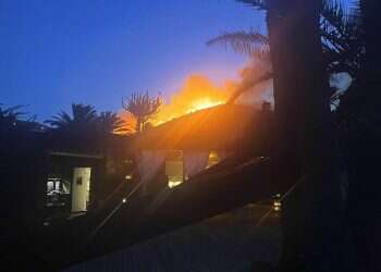 Designer Giorgio Armani, guests flee wildfire on Sicilian island