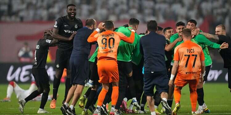 Maccabi Haifa celebrates after the Champions League play-off, second leg soccer match in Belgrade, Serbia Maccabi Haifa's Champions League advance stuns Israelis