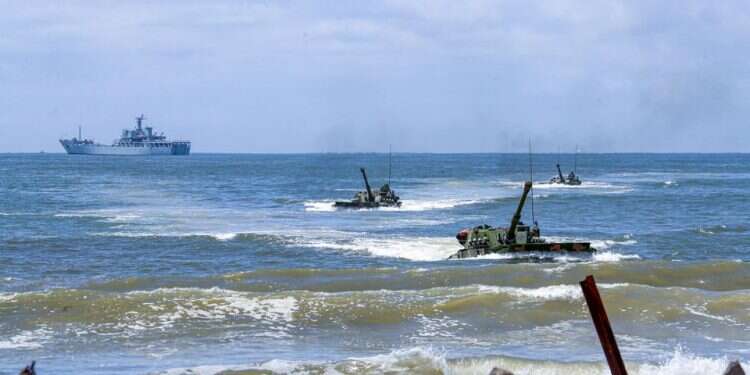 Amphibious armored vehicles under Chinese People's Liberation Army Eastern Theatre Command take part in an assault wave formation training exercise in Zhangzhou, Fujian province, China, August 14, 2022 China stages more drills near Taiwan as US lawmakers visit