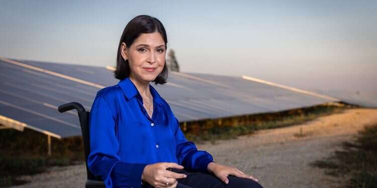Energy Minister Karine Elharrar (Yesh Atid) is pictured against Solegreen's solar panels at Neveh Mivtah in southern Israel 'The energy future of the world is green, not gas'