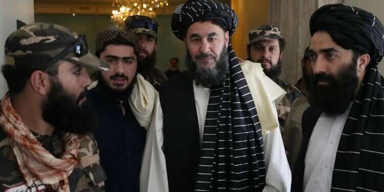 Bashir Noorzai, center, a senior Taliban detainee held at Guantanamo attends his release ceremony, at the Intercontinental Hotel, in Kabul, Afghanistan, Monday, Sept. 19, 2022 US confirms release of American in exchance for Taliban official