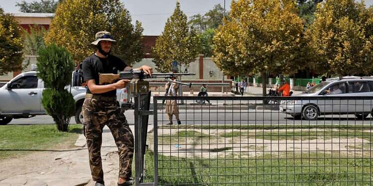 A Taliban fighter stands guard after a blast in front of the Russian embassy in Kabul, Afghanistan, September 5, 2022 Blast at Russian Embassy in Kabul leaves 2 staff among dead