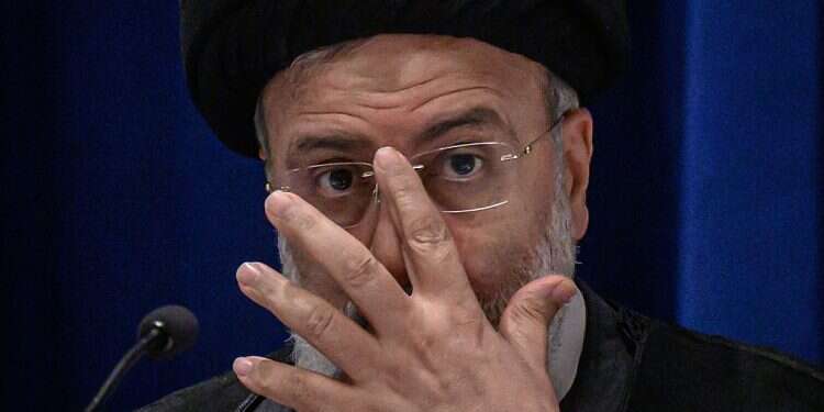 Deceased Iranian President Ebrahim Raisi (AFP/Ed Jones) Iranian president cancels interview after news anchor refuses to wear hijab