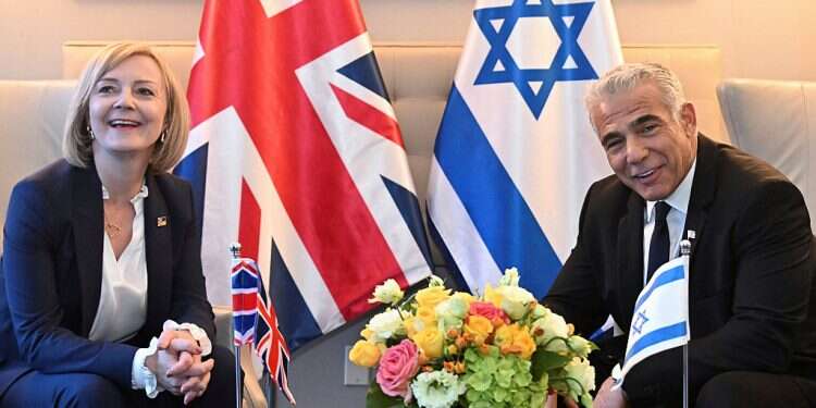 British Prime Minister Liz Truss and Israeli Prime Minister Yair Lapid hold a bilateral meeting as they attend the 77th UN General Assembly in New York, Sept. 21, 2022 Report: British PM Truss considering moving embassy to Jerusalem