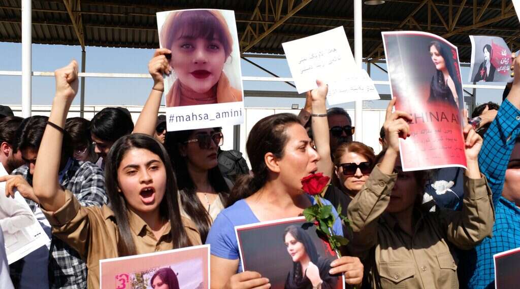 Protesters gather outside the UN headquarters in Erbil on Sept. 24, 2022, to protest the death of Masha Amini, who had fallen into a coma for three days after being detained by the morality police in Tehran, Iran 'A time bomb': Anger rising in a hot spot of Iran protests