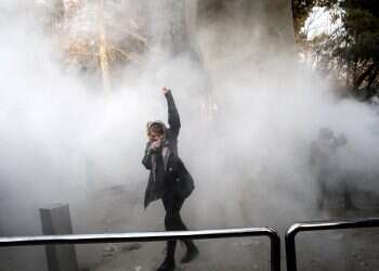 Clashes at Tehran university after female students enter hall without hijabs