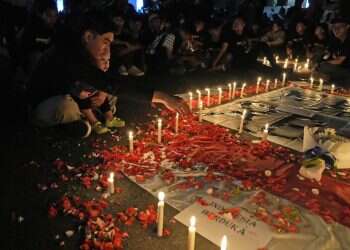 125 dead after tear gas triggers crush at Indonesia soccer match