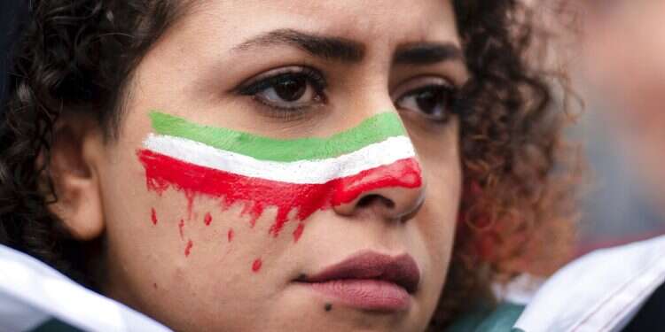 Iran protests rage on streets as officials renew threats