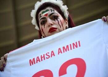 'This is not my national team': Iranian protesters see hope in World Cup defeat