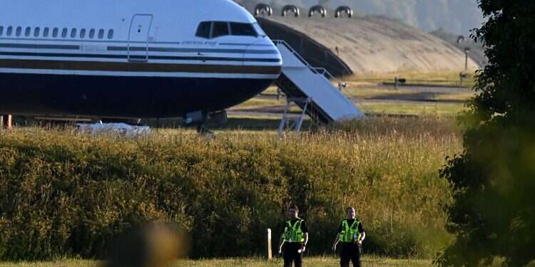 A Boeing 767 sits on the runway at the military base in Amesbury, Salisbury, preparing to take a number of asylum-seekers to Rwanda
in June, 2022 Court says UK's Rwanda deportation plan lawful