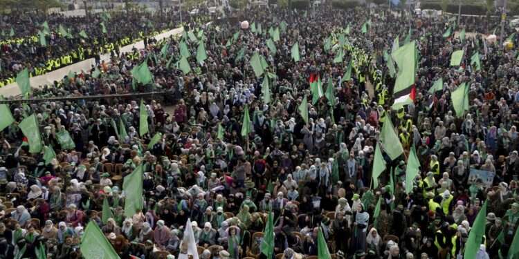 Hamas supporters gather during a rally marking the 35th anniversary of the Hamas movement's founding in Gaza City, Wednesday, Dec. 14, 2022 Hamas marks anniversary, predicts confrontation with Israel