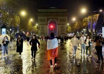 France fans react on the Champs-Elysees during the final between France and Argentina - Paris, France - December 18, 2022 The French masses woke up too late in the game